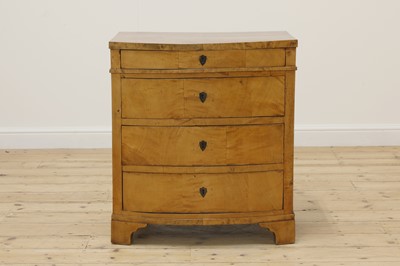 Lot 350 - A small Empire satin birch commode