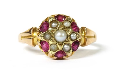 Lot 1028 - A Victorian 15ct gold split pearl and ruby cluster ring