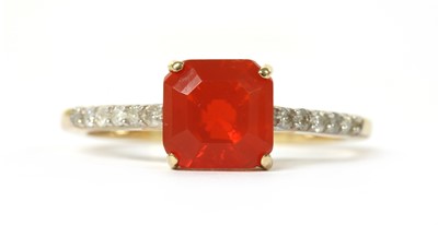 Lot 1175 - A gold fire opal and diamond ring