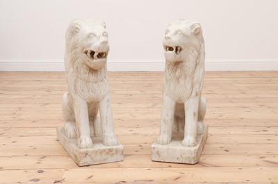 Lot 147 - A pair of marble seated lions