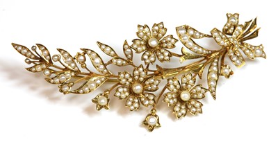 Lot 154 - A late Victorian gold split pearl spray brooch, c.1900