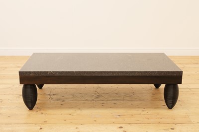 Lot 256 - A porphyry-topped rectangular low table