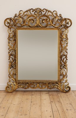 Lot 609 - A carved giltwood Florentine mirror