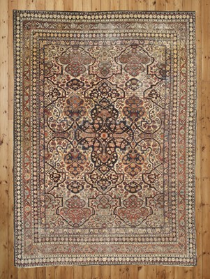 Lot 128 - A Kirman wool carpet
