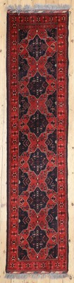 Lot 236 - A tribal wool runner