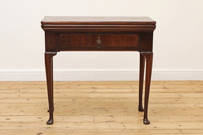 Lot 332 - A George III mahogany triple fold-over games and tea table