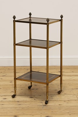 Lot 246 - A three-tier étagère occasional table