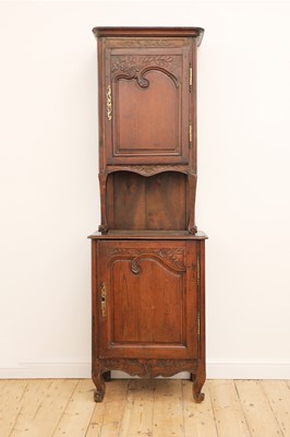 Lot 401 - A French provincial pine and walnut cupboard