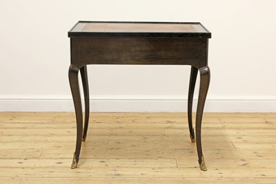 Lot 619 - An ebony tric-trac table