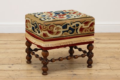 Lot 18 - A walnut stool in the manner of A W N Pugin