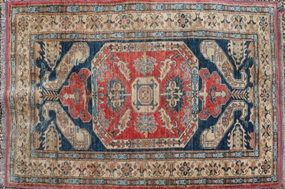Lot 297 - A Kazak rug