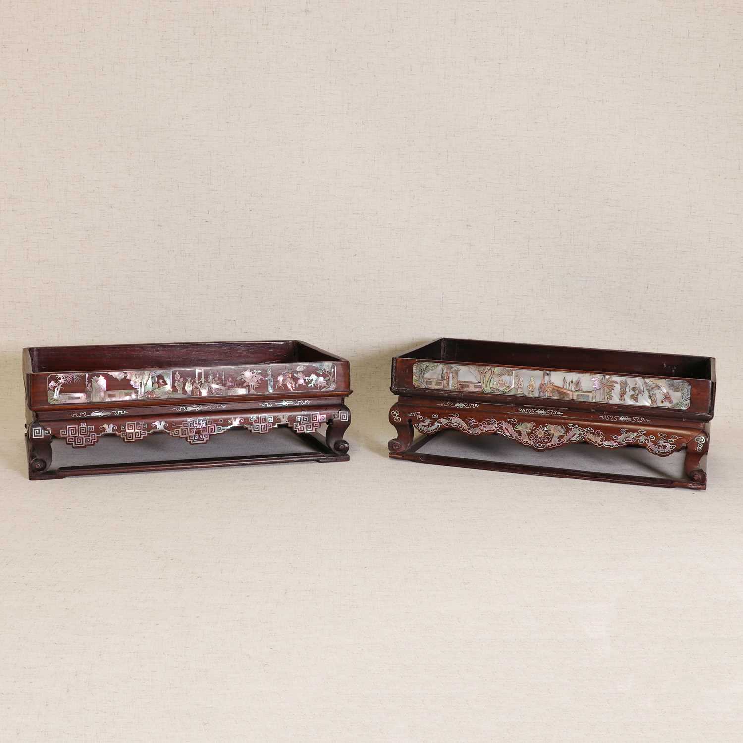 Lot 101 - Two Chinese rosewood tray stands