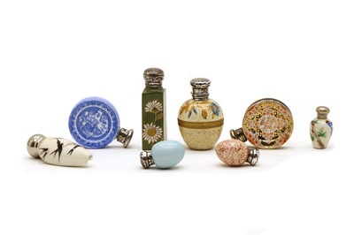 Lot 75 - A collection of ceramic scent bottles