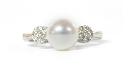 Lot 1262 - A white gold cultured freshwater pearl and diamond ring