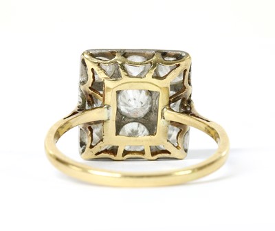 Lot 1069 - A diamond set square cluster ring