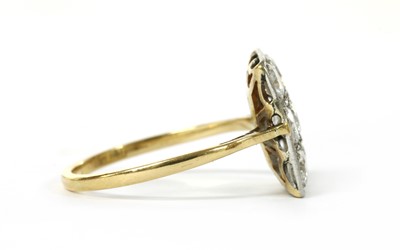 Lot 1069 - A diamond set square cluster ring