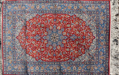 Lot 261 - An Isfahan part silk rug