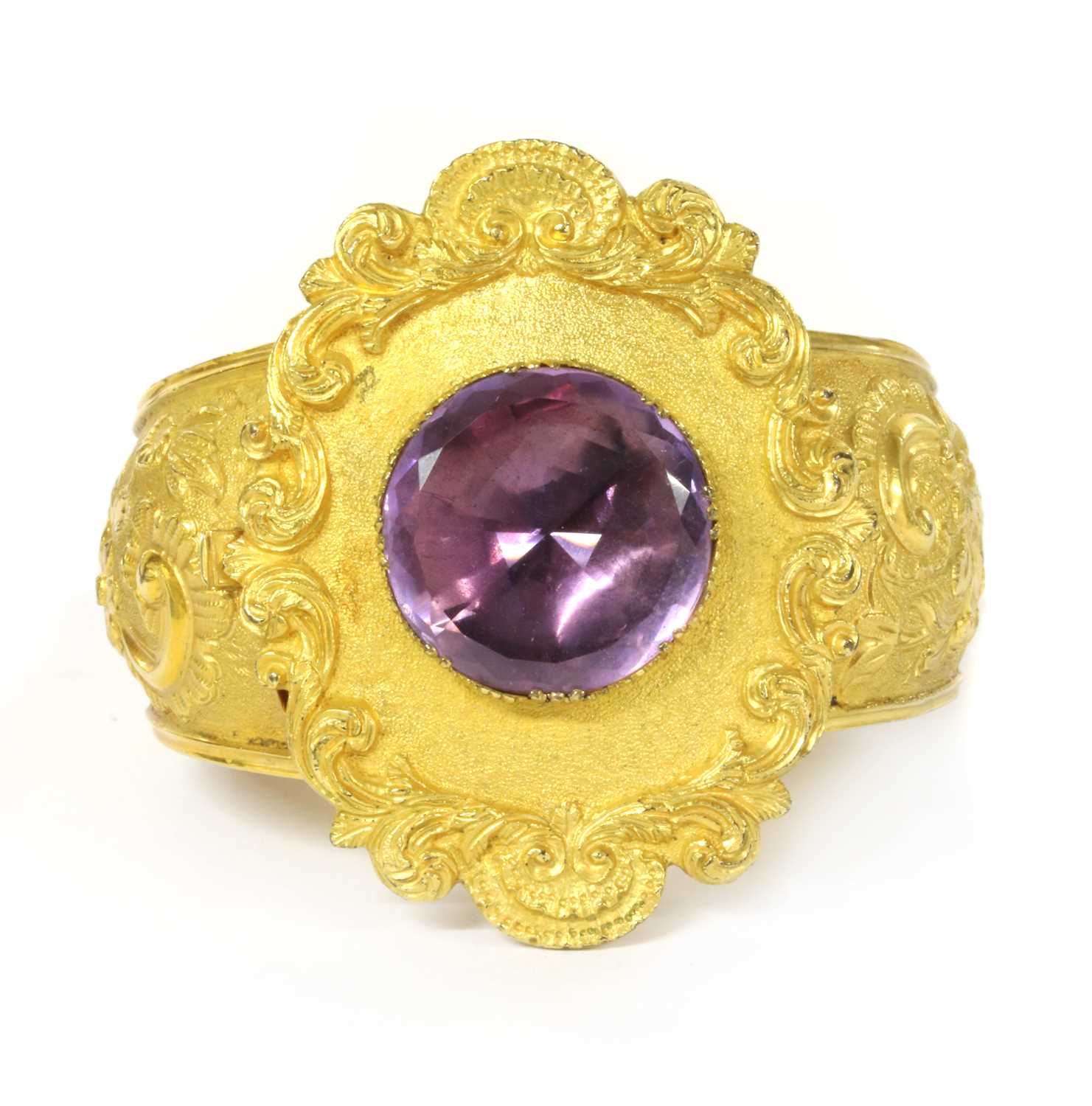 Lot 1017 - A Victorian gilt metal amethyst bangle