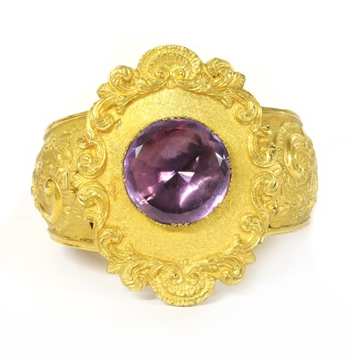 Lot 1017 - A Victorian gilt metal amethyst bangle