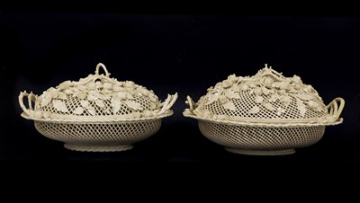 Lot 212 - A pair of Belleek-type porcelain baskets and covers