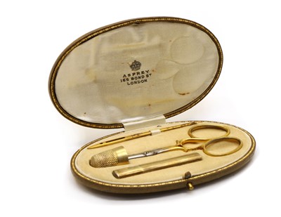 Lot 67 - An Edwardian silver gilt sewing etui