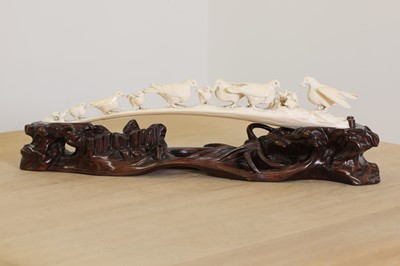 Lot 180 - A Japanese carved ivory dove bridge group