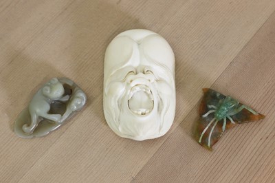 Lot 165 - A Japanese carved ivory mask