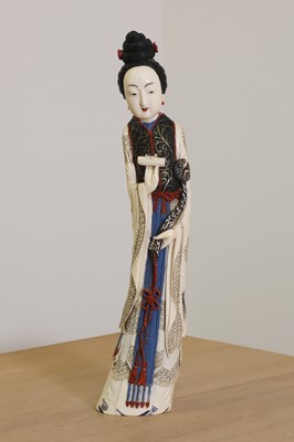Lot 164 - A Chinese carved ivory 'long' lady