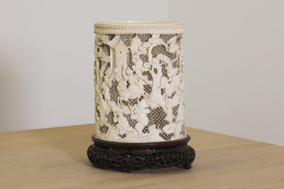 Lot 152 - A Chinese carved ivory brush pot