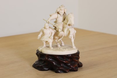 Lot 159 - A Japanese carved ivory samurai warrior group