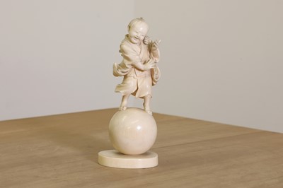 Lot 158 - A Japanese carved ivory figure of a child