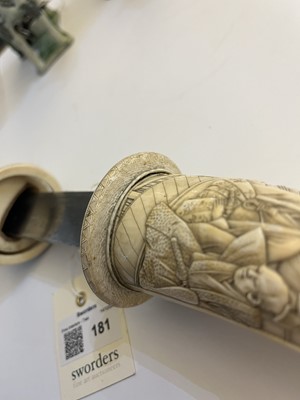 Lot 181 - A Japanese carved ivory short sword