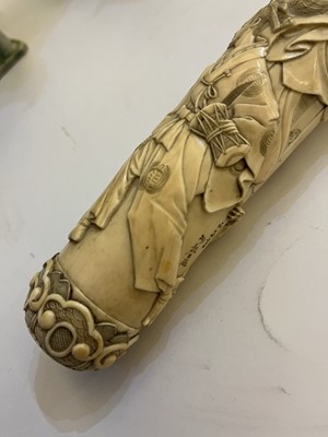 Lot 181 - A Japanese carved ivory short sword