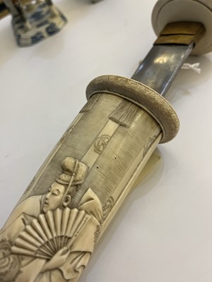 Lot 181 - A Japanese carved ivory short sword