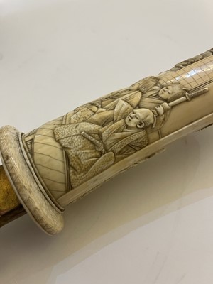 Lot 181 - A Japanese carved ivory short sword
