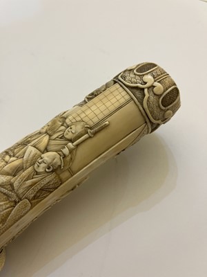 Lot 181 - A Japanese carved ivory short sword