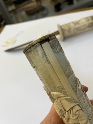Lot 181 - A Japanese carved ivory short sword