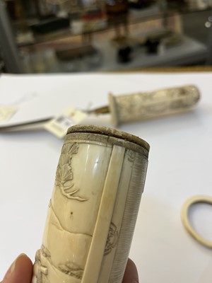 Lot 181 - A Japanese carved ivory short sword