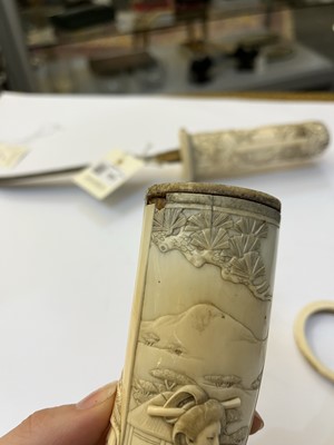 Lot 181 - A Japanese carved ivory short sword