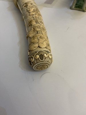 Lot 181 - A Japanese carved ivory short sword