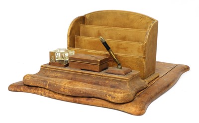 Lot 203 - An embossed leather ten-piece desk set