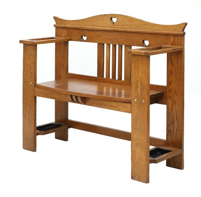 Lot 157 - An Arts and Crafts oak hall seat