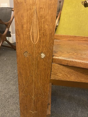 Lot 157 - An Arts and Crafts oak hall seat
