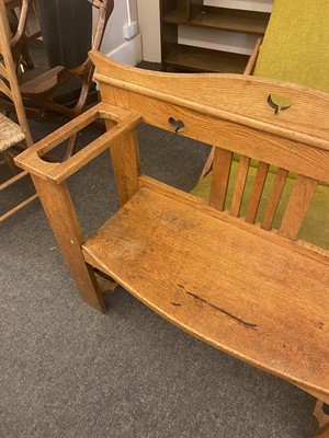 Lot 157 - An Arts and Crafts oak hall seat