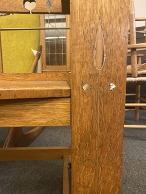 Lot 157 - An Arts and Crafts oak hall seat