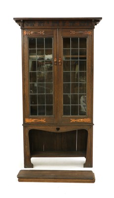 Lot 195 - An Arts and Crafts oak bookcase