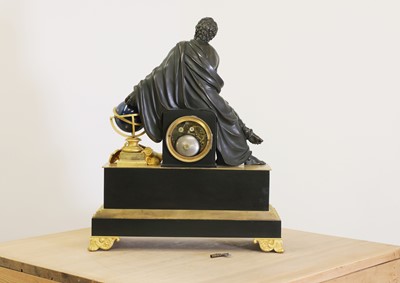 Lot 198 - An Empire-style patinated and gilt-bronze mantel clock