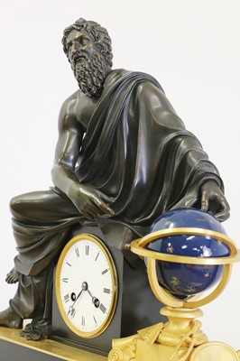 Lot 198 - An Empire-style patinated and gilt-bronze mantel clock