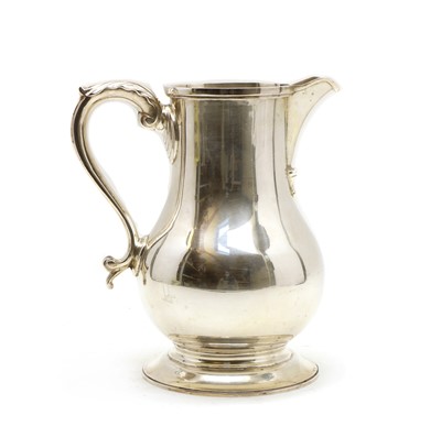 Lot 1 - A silver baluster form water jug