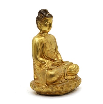 Lot 76 - A Sino-Tibetan bronze Buddha
